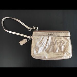 Coach small gold wristlet